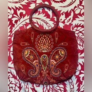 Hand Embroidered - MOYNA - leather bagw/ paisley details and red silk liner.